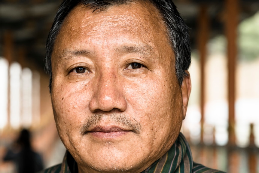 Headshot of Dr Chencho Dorji.