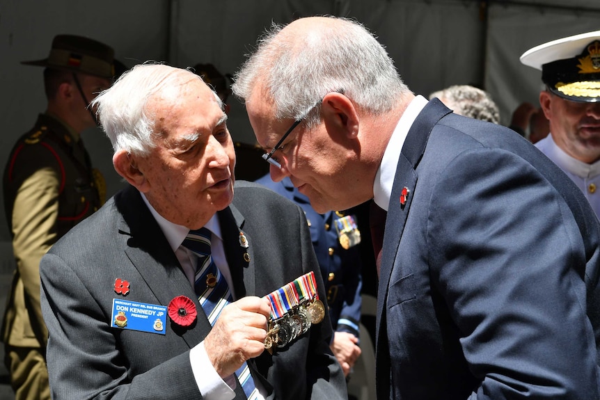 Scott Morrison talks to Don Kennedy at a Remembrance Day service in Sydney