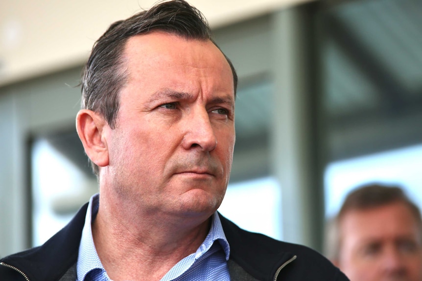 Mark McGowan standing outside his Rockingham electorate office, Reece Whitby is behind him.