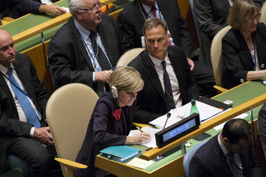 Julie Bishop sits at the UN with her partner