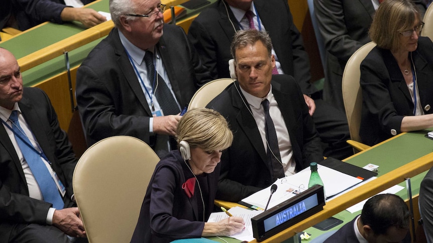 Julie Bishop sits at the UN with her partner