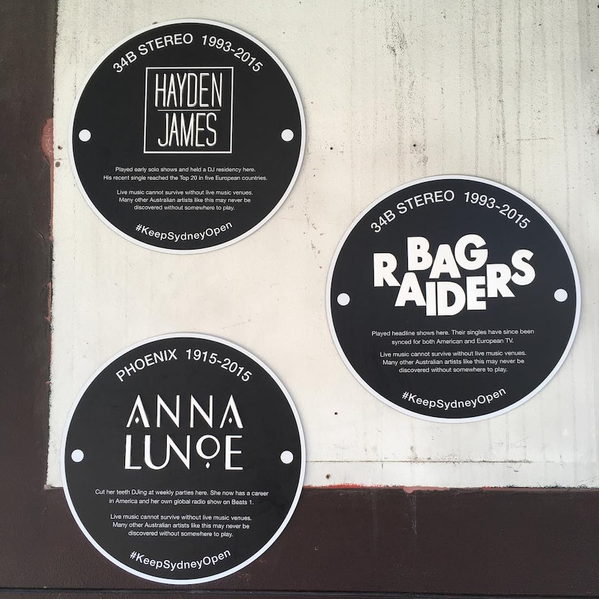 Three plaques for artists Hayden James, Anna Lunoe and Bag Raiders on the wall