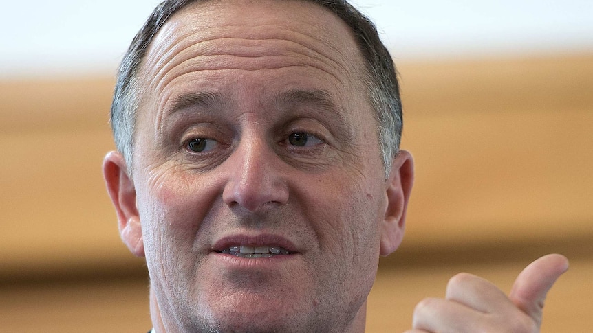 NZ prime minister John Key speaks to students