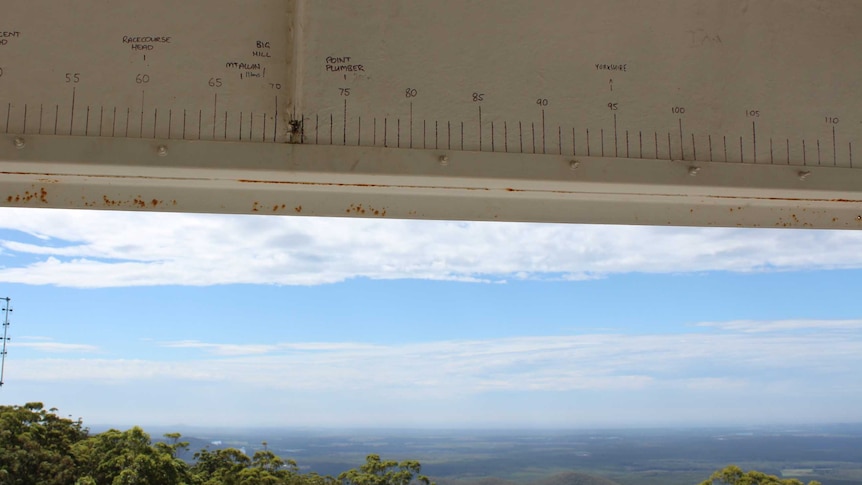 Lines and numbers marked on the ceiling of a fire tower.