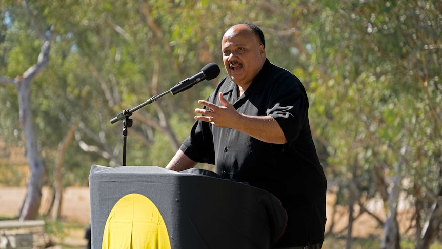 Martin Luther King III speaks at a podium