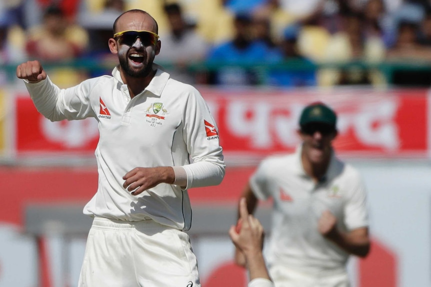 Nathan Lyon celebrates another wicket for Australia in Dharamsala