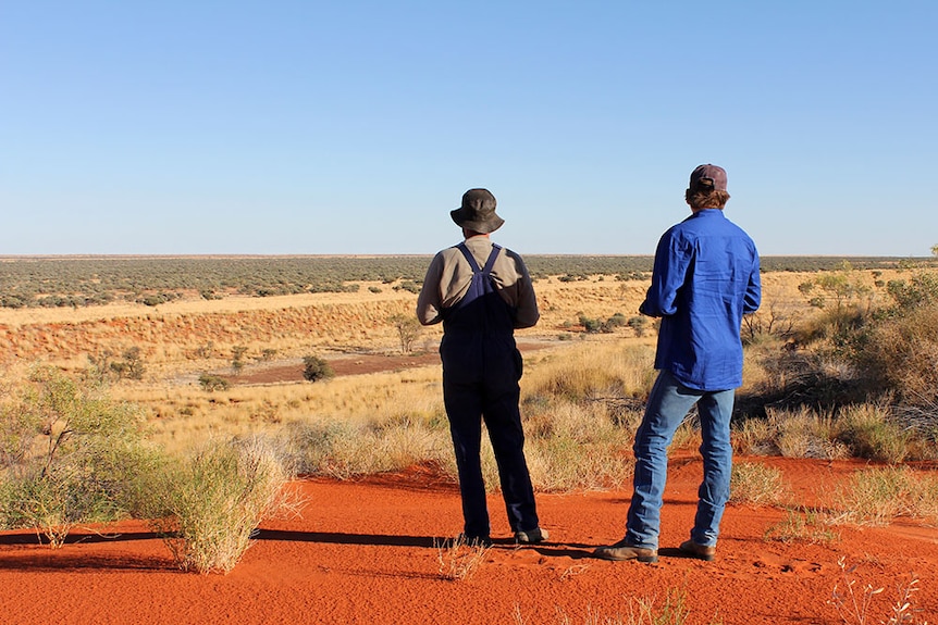 Friends, Grant Irving and Matt Warr looking over the red sand hills of Ethabuka.