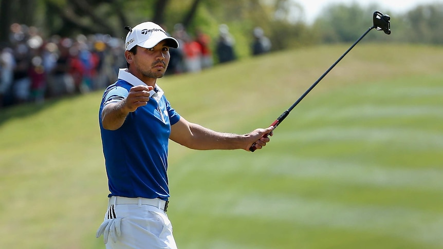 Jason Day celebrates scrambling par at WGC Matchplay