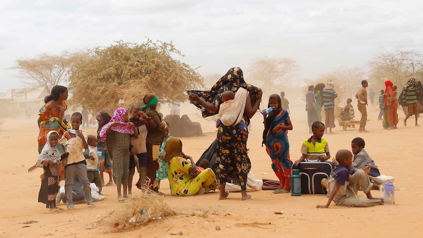 Refugees outside the world's largest camp, near the Kenya-Somalia border