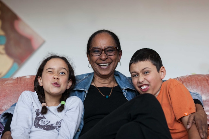 Former actress and singer Deni Gordon with her grandchildren in Sydney, 2017