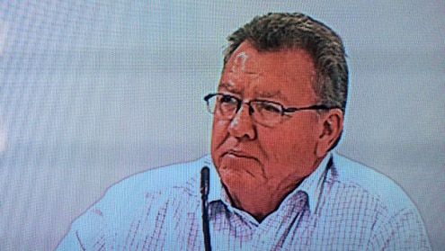 Close up shot of Richard Burton in the witness box at the Trade Union Royal Commission