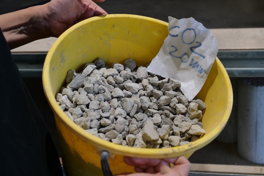 A bucket of concrete aggregate