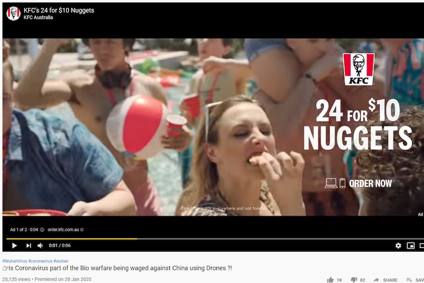 A woman bites chicken with a pool in the background.