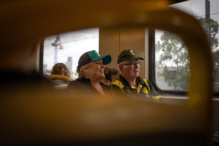 Jo Eyes from Wyong Creek New South Wales catches a train with friend Kevin Hibbert from Melbourne to the Shane Warne Memorial.