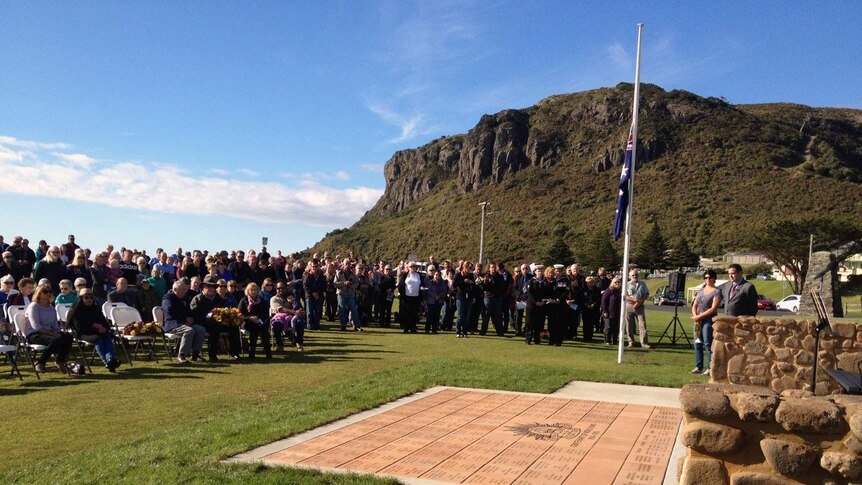Crowds gather at the new war memorial in Stanley