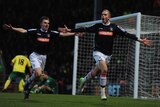 Scott Rendell (R) celebrates after scoring for Luton Town in the FA Cup against Norwich City.