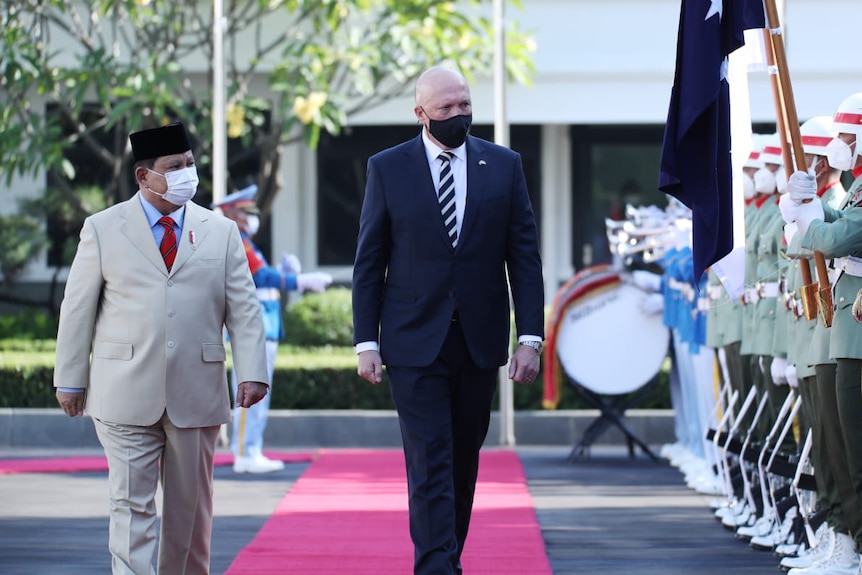 Indonesian Defence Minister Prabowo Subianto and Peter Dutton inspect a guard of honour