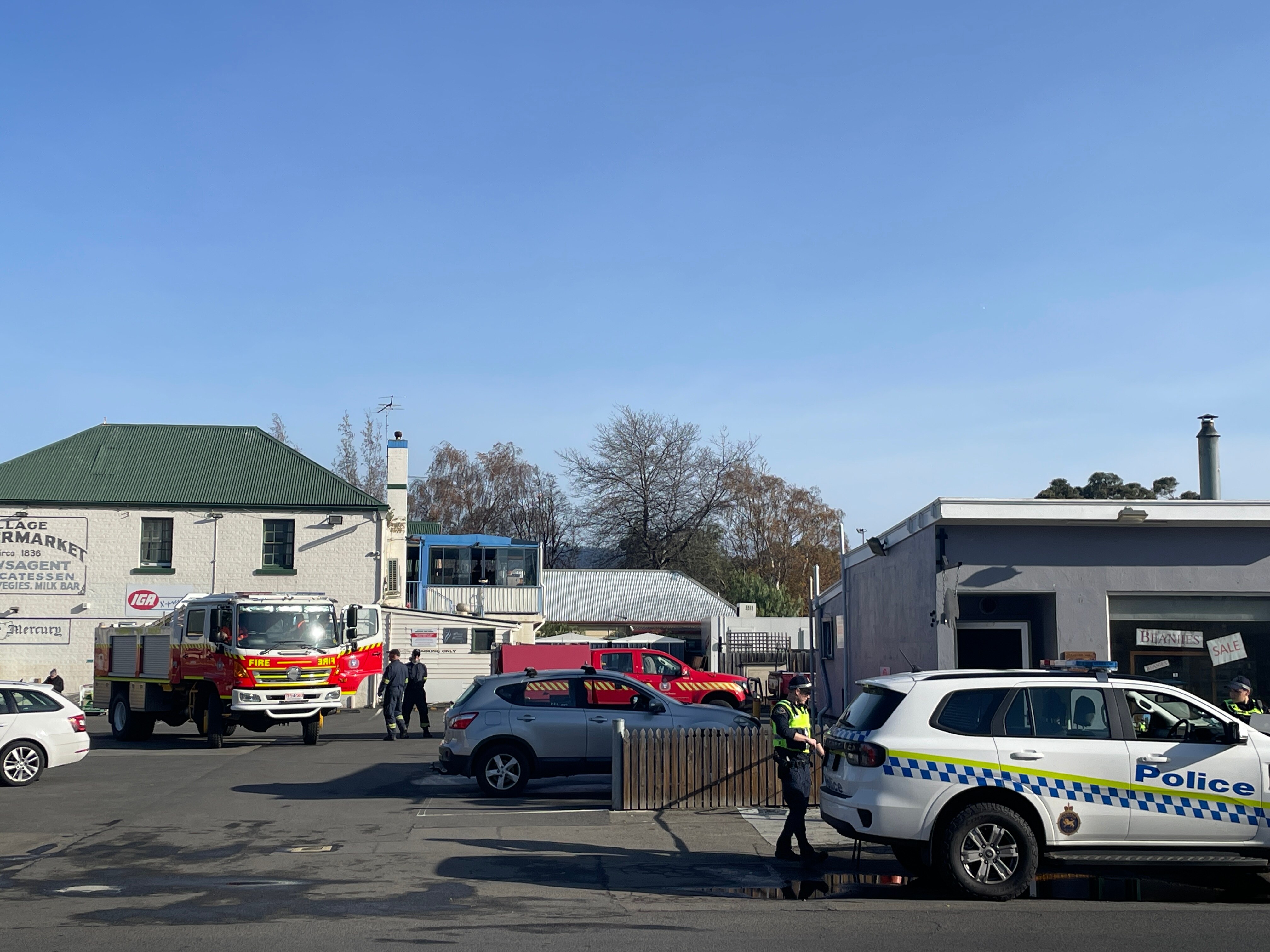 Police and fire service vehicles at a suburb