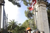 Italian Carabinieri and firemen leave the Swiss embassy in Rome