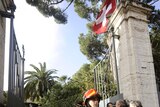 Italian Carabinieri and firemen leave the Swiss embassy in Rome