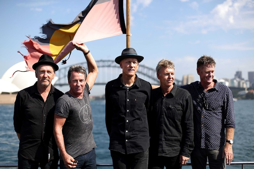 Midnight Oil announcing their upcoming World Tour