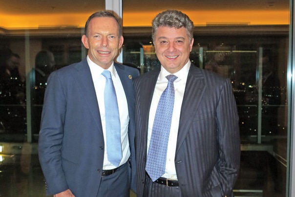 Former PM Tony Abbott pictured with Florin Burhala.