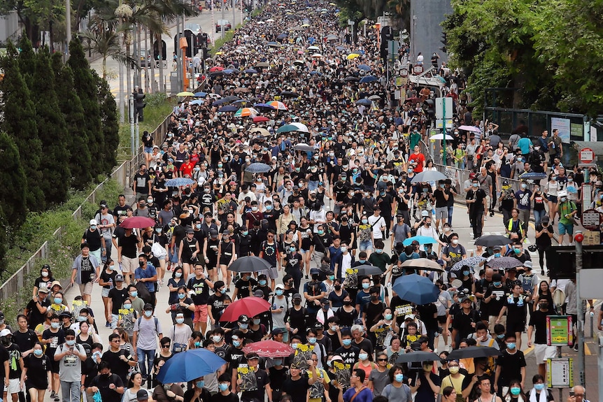 Residents take part in the anti-extradition bill protest march at Shum Shui Po in Hong Kong.