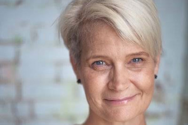 Smiling headshot of Sue-Swinburne.