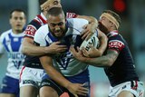 On the rampage ... Sam Kasiano meets the Roosters defence