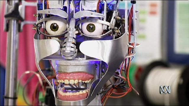 A robot with eyeballs and human teeth