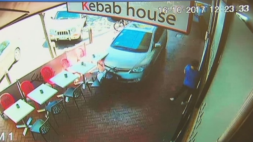 CCTV footage shows a car ploughing through a cafe in Clayton.