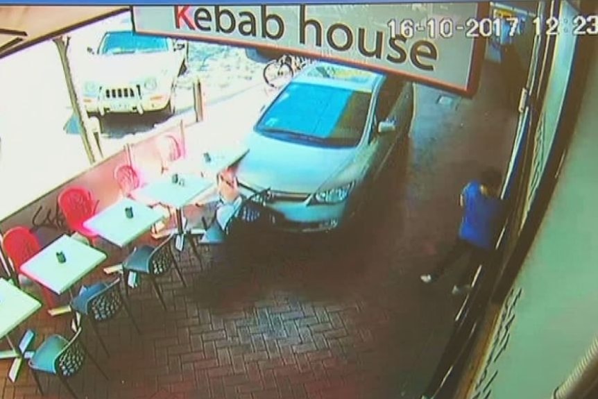 CCTV footage shows a car ploughing through a cafe in Clayton.