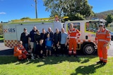 The group of campers with an SES truck and SES members.
