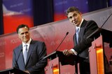 Mitt Romney (left) and Rick Perry largely overshadowed the six other candidates.