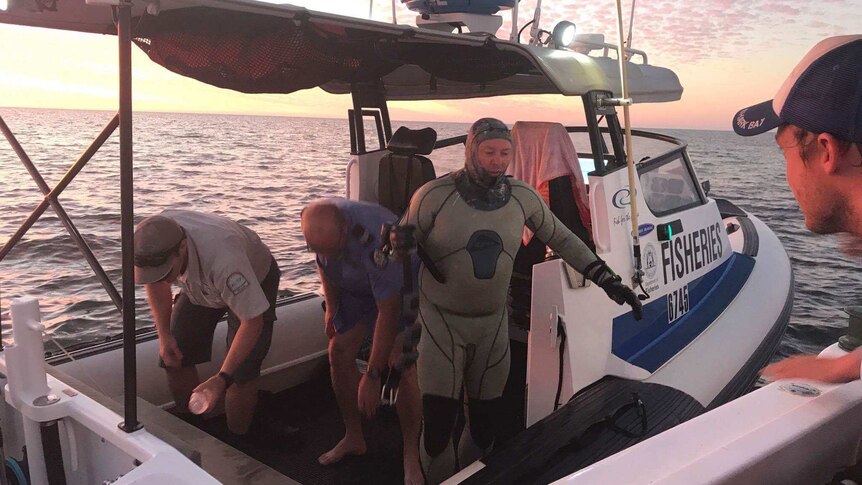 John Craig on the boat after being rescued