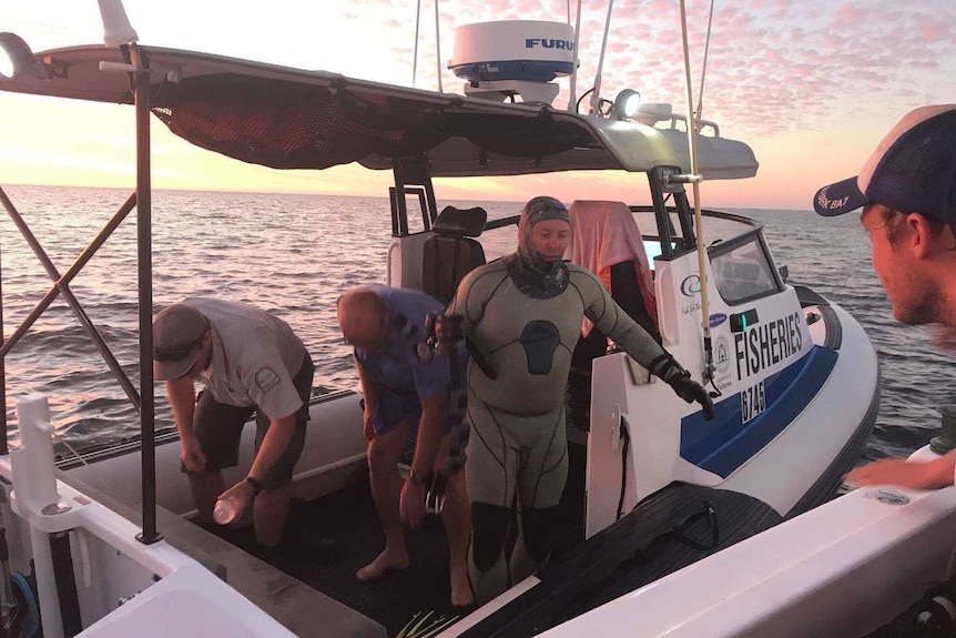 John Craig on the boat after being rescued