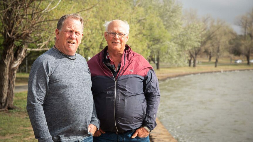 Brent Deans and Adam Visser are by Lake Burley Griffin for an early walk.