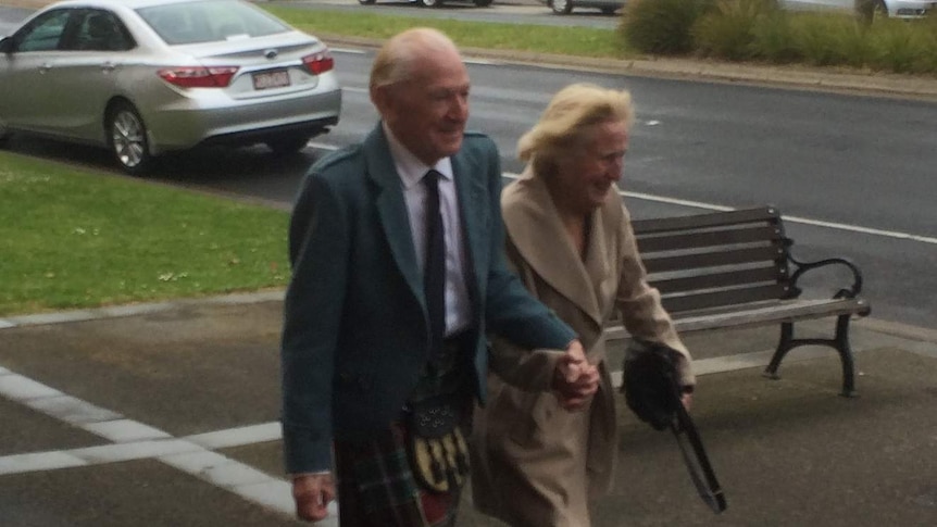 Convicted former school teacher Lawrence Stevenson with his wife outside the Sale Magistrates' Court