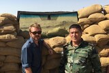 Wyatt Roy with a member of the Peshmerga in Sinjar area, west of Mosul, Iraq.