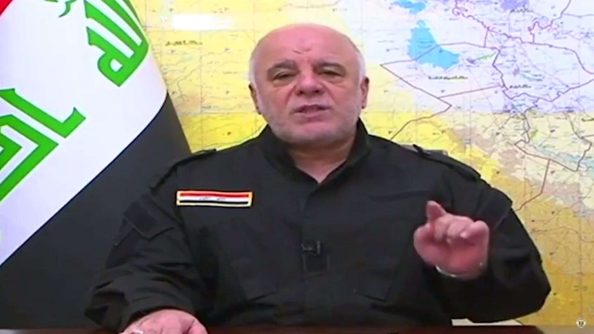 Iraqi Prime Minister Haider al-Abadi points his finger as he speaks about the battle to retake Tal Afar.