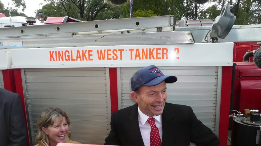 Tony Abbott dons a cap in Kinglake