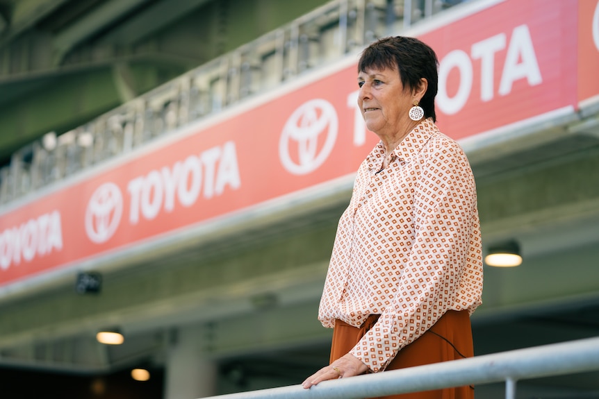 Jan Cooper looking out on to the football field.