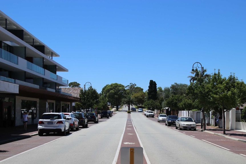 Waratah Avenue in Dalkeith, showing a three-storey development on one side and single storey housing on the other.