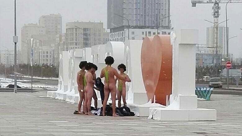 A group of Czech tourists dressed in Borat swimsuits in Astana, Kazakhstan.