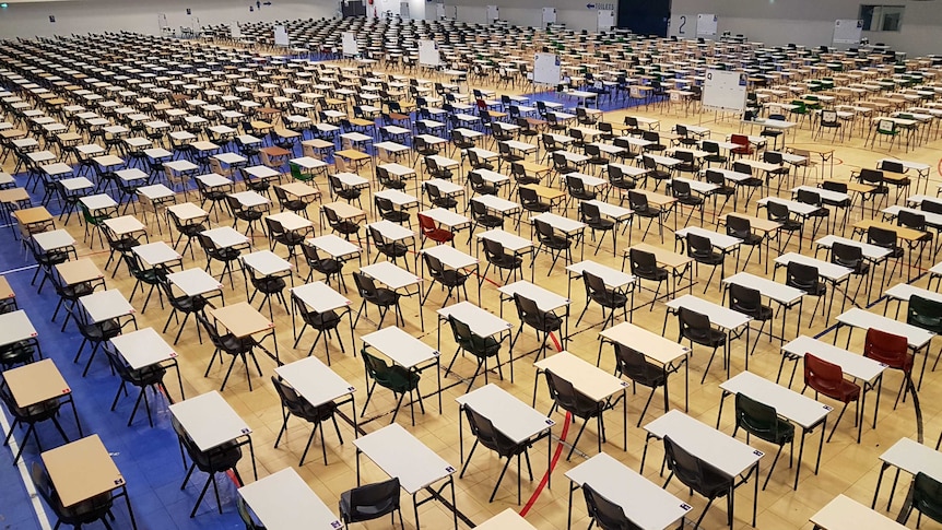 Rows and rows of empty desks ready for exam time