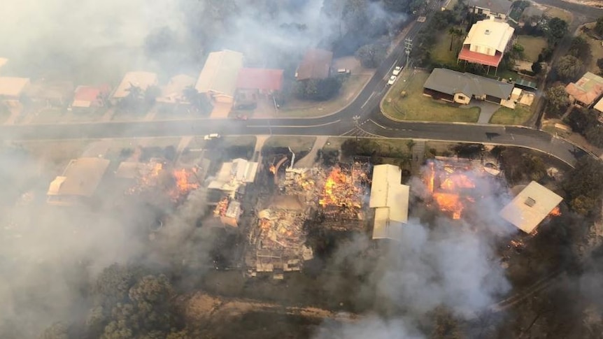 Houses burning down.