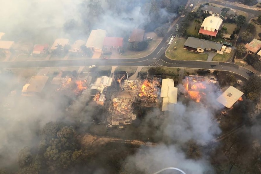 Houses burning down.