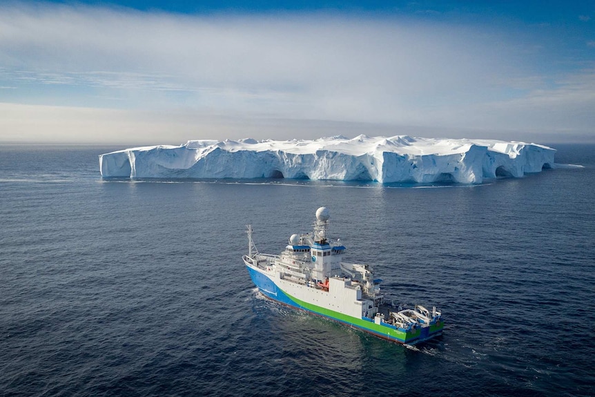 Drone picture of RV Investigator and iceberg
