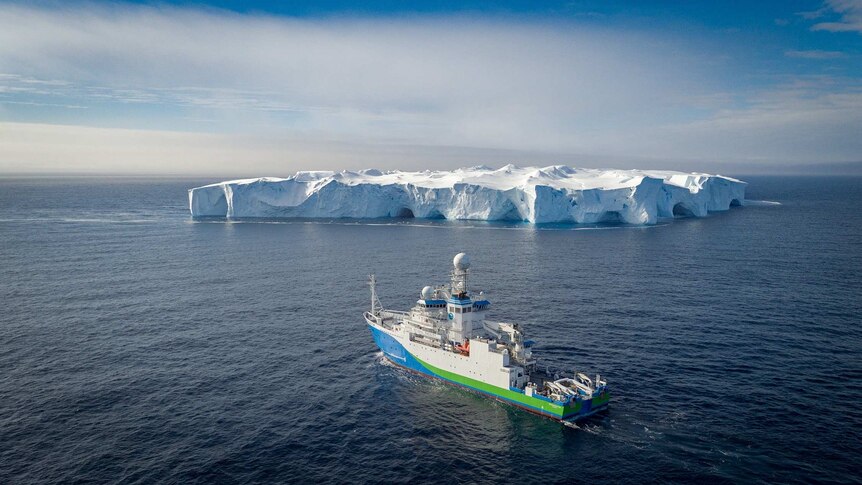 Drone picture of RV Investigator and iceberg