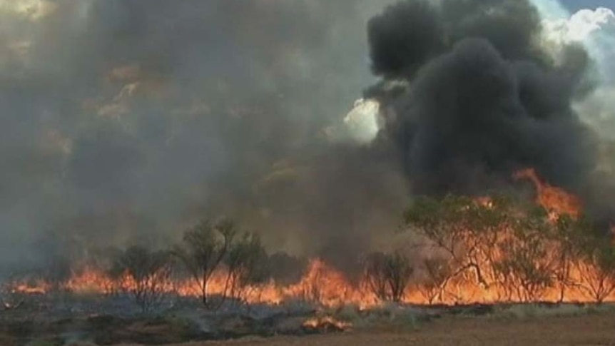 Battle to tame Red Centre fires continues